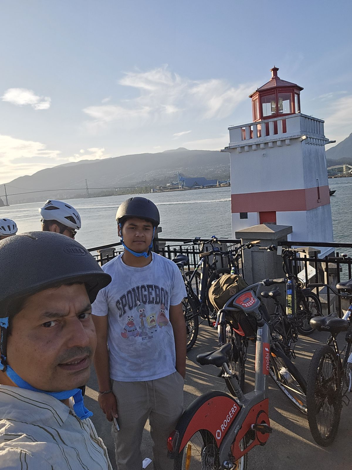Biking by the lighthouse in Vancouver
